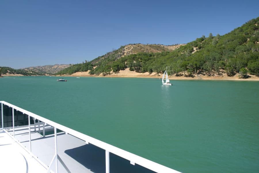 Breathe in the fresh air and soak up the sun on board a houseboat