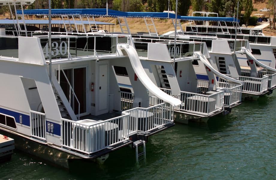 Slide off of the houseboat top deck into the refreshing waters