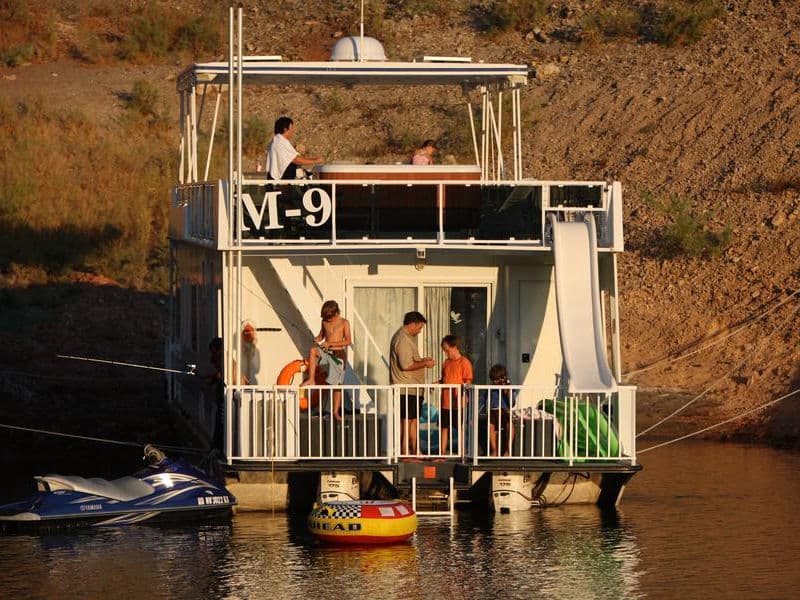 Rest in your houseboat on shore after a long fun day in the sun Photos